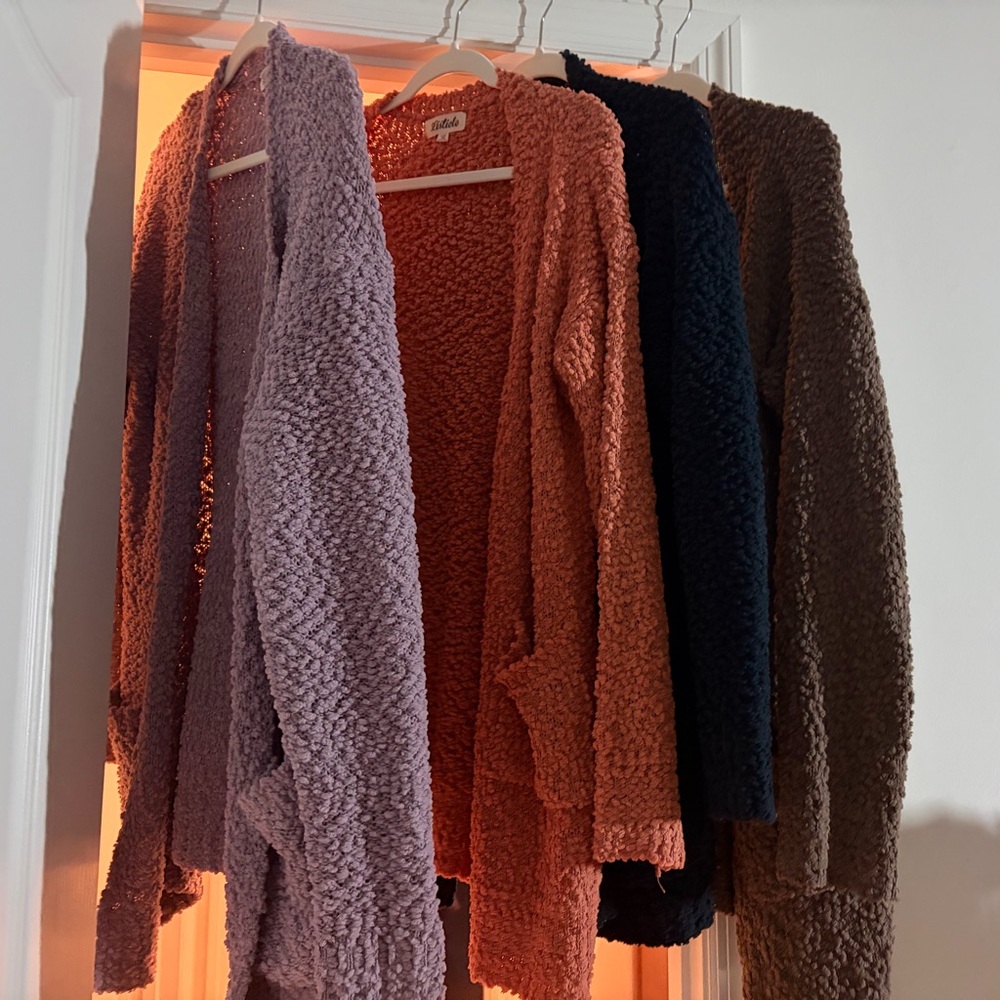 4 size large popcorn cardigans up for grabs. All are in great condition.
